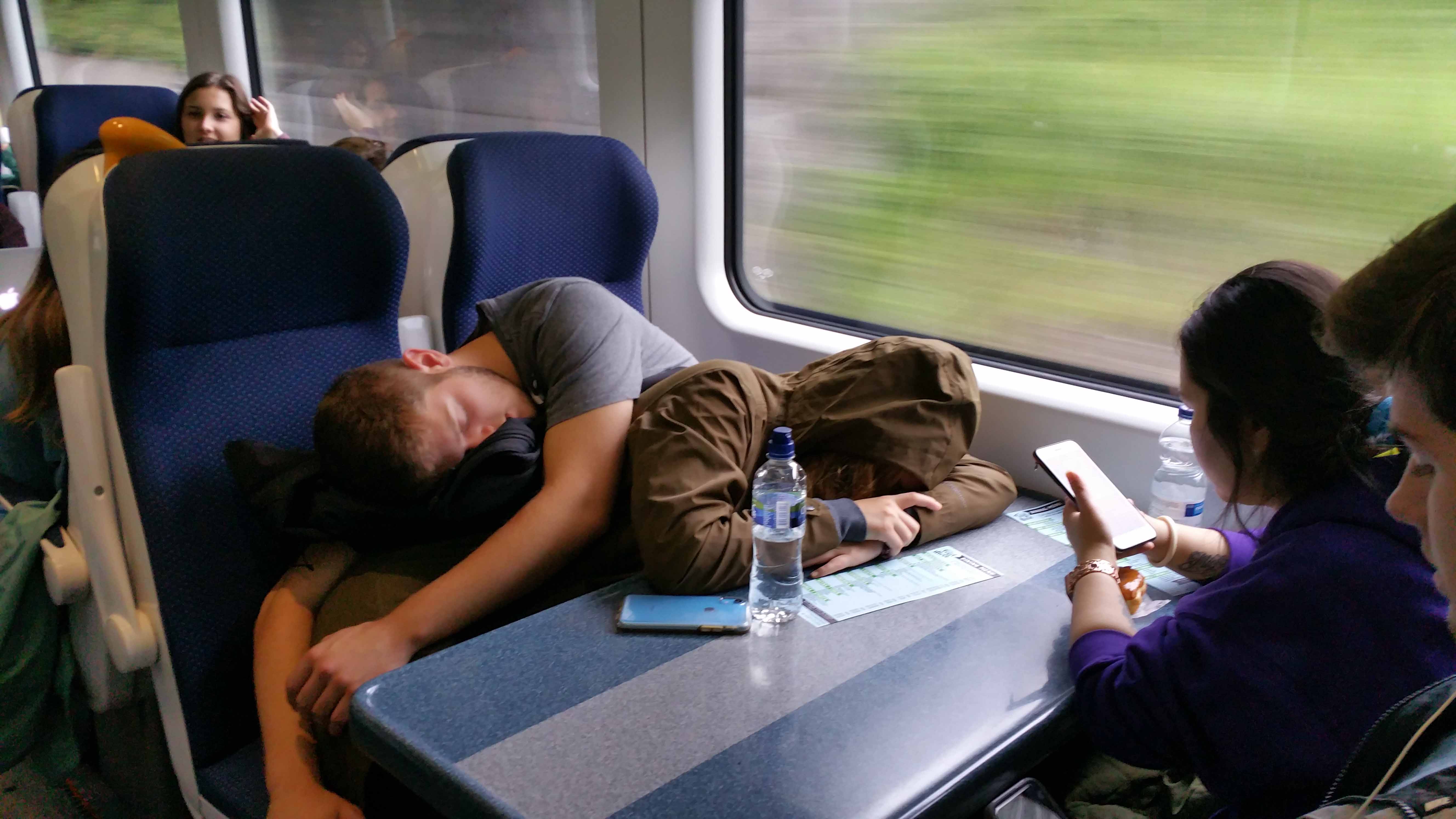 Students sleeping on the train