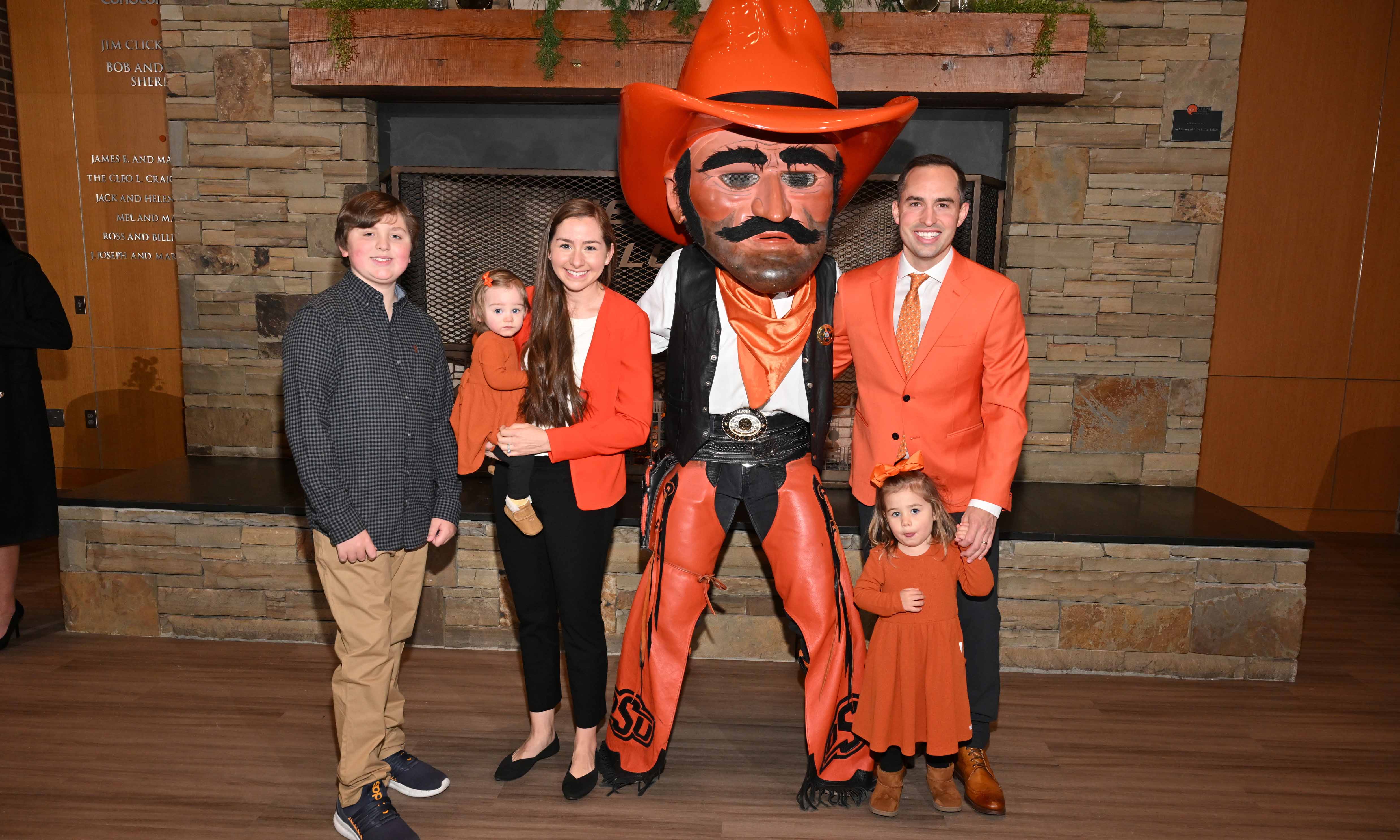 Alum and family posing with Pistol Pete Alum and family posing with Pistol Pete