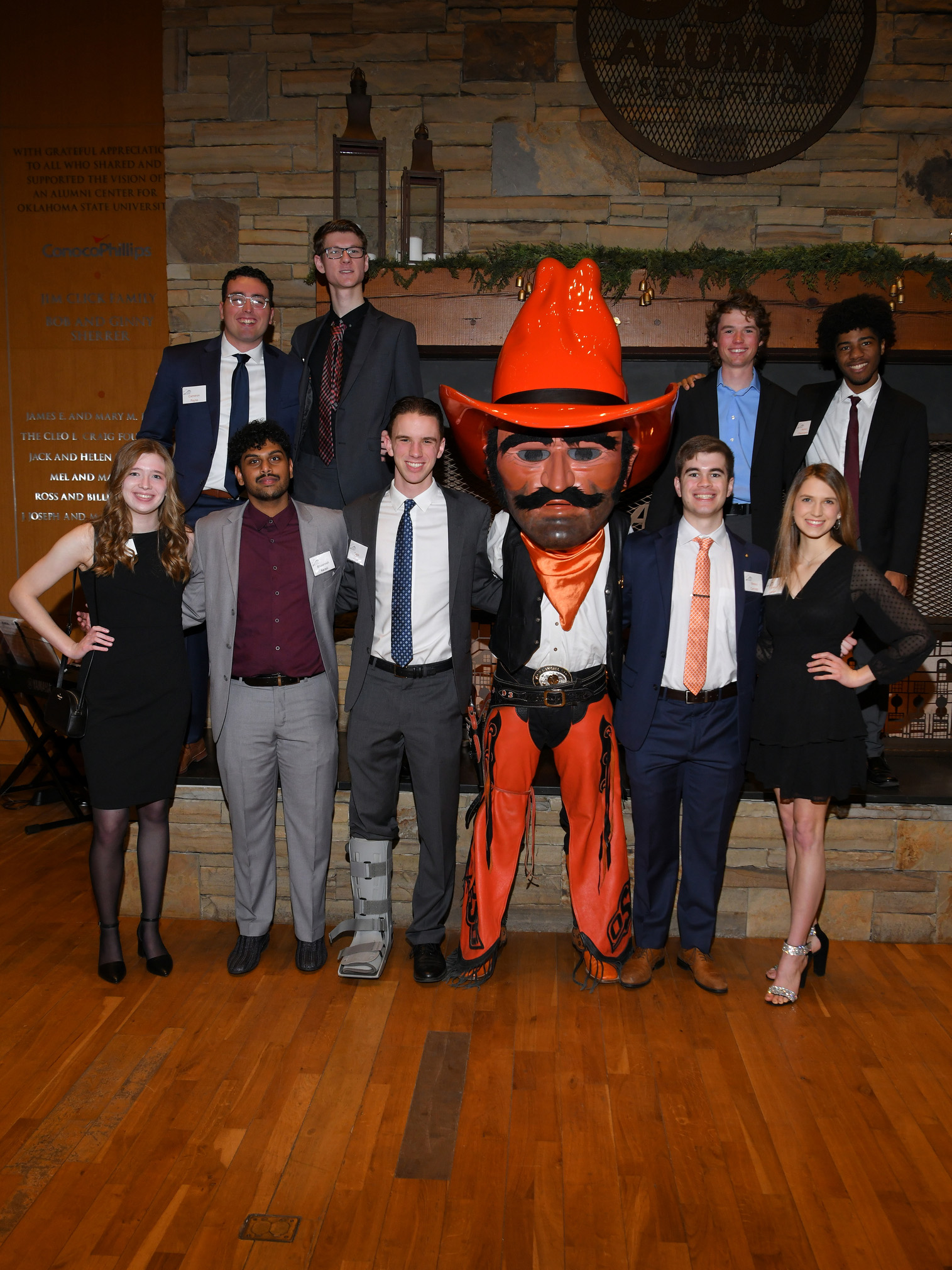 Students posing with Pistol Pete Students posing with Pistol Pete