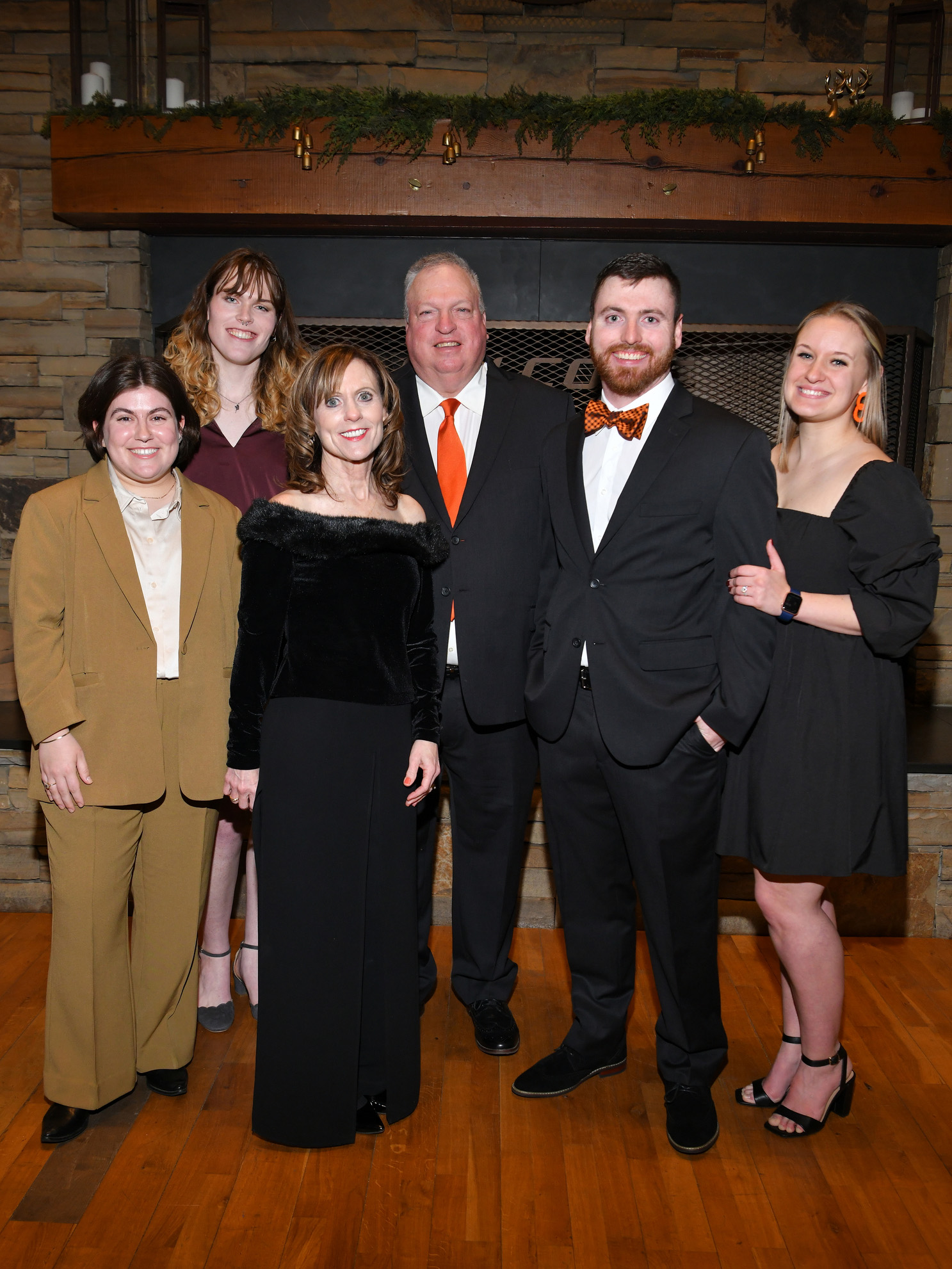 Family smiling with their honoree. Family smiling with their honoree.