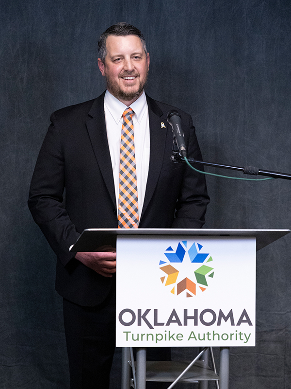 Joe Eschelle speaking at a press conference.