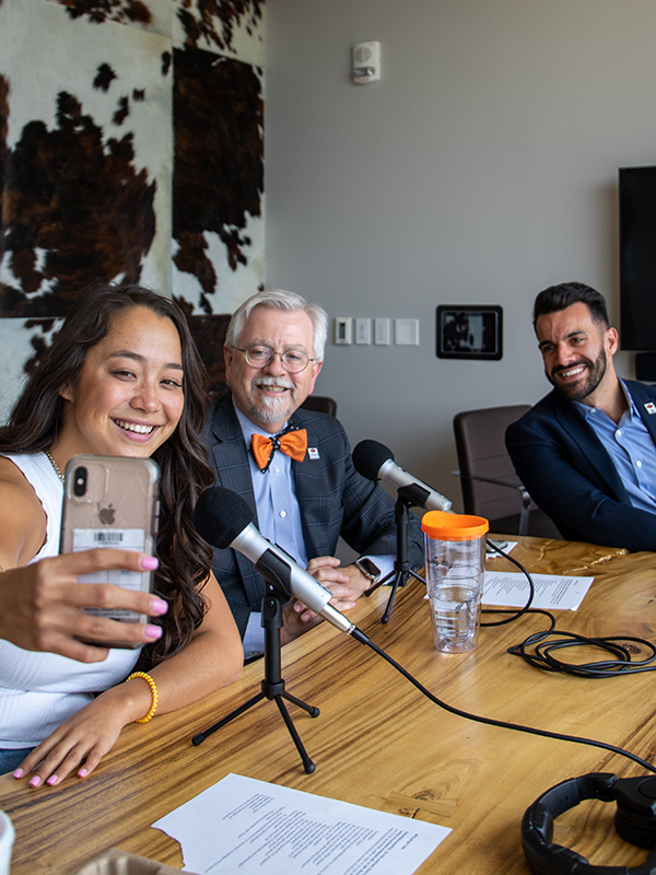 Dean Eastman recording a Buzz on Business podcast